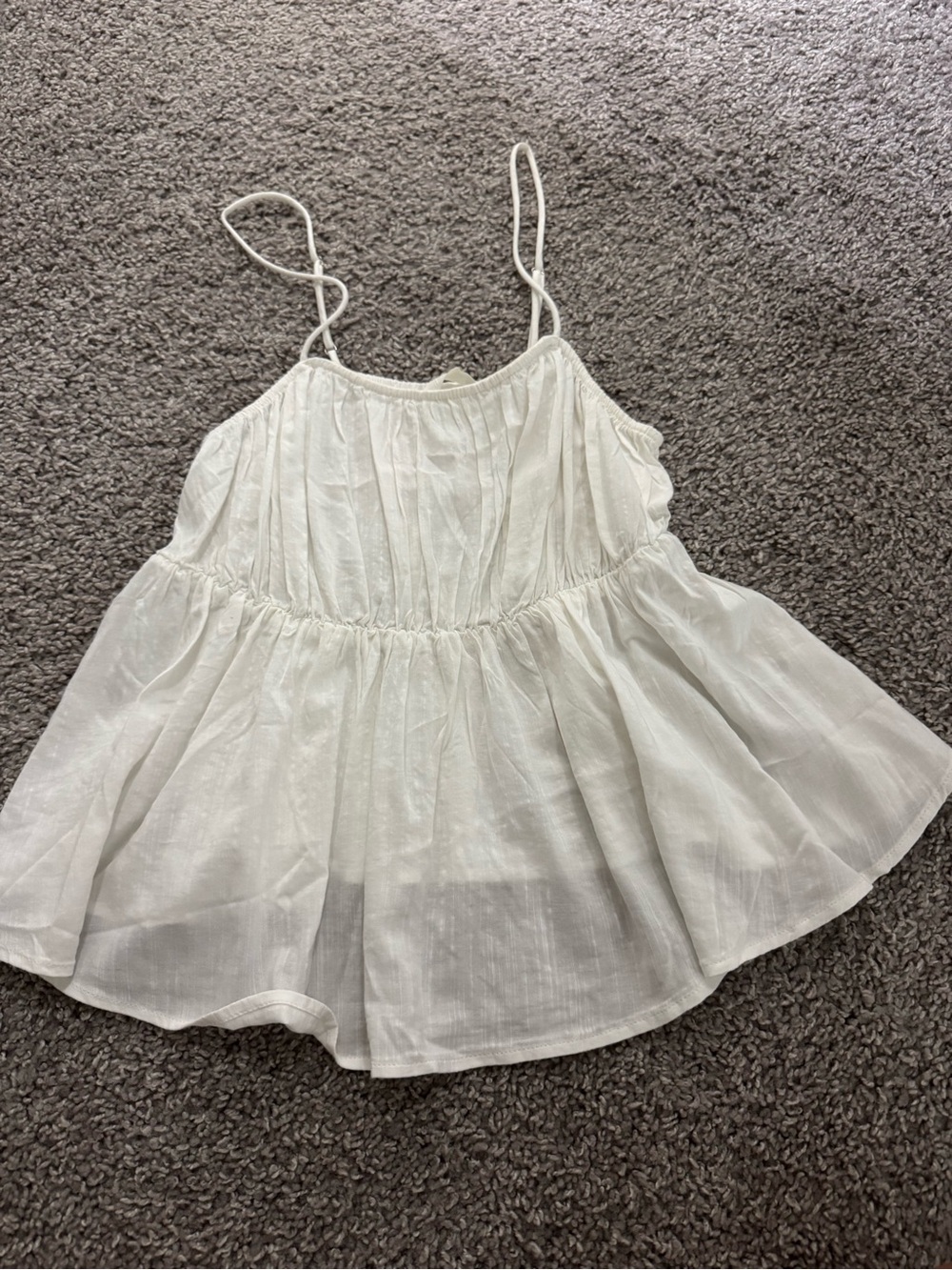 White flowy top